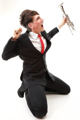 Obraz premium young man joy, glee and his Trumpet