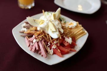 Ham with eggs and vegetables