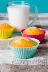 Glass of milk and cupcakes