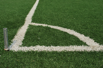 At the corner of artificial football field