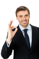 Businessman with okay gesture, isolated