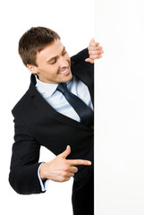 Businessman showing blank signboard, isolated