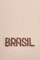 Brasil written with coffee beans on canvas