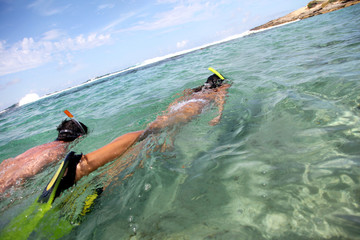 Couple snorkeling in Caribbean waters