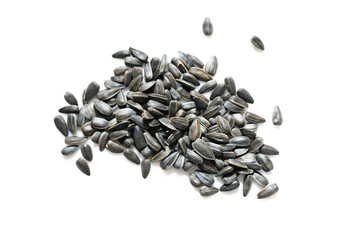 many sunflower seeds on white backgroun
