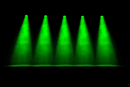 Five Separate Green Spotlights Side By Side