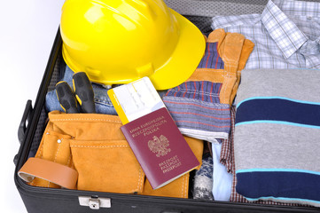 suitcase with clothes of the worker