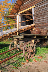 Fototapeta premium aging cart near rural stable