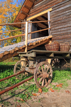 aging cart near rural stable