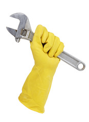 Gloved hand holding a wrench