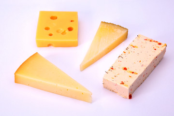 different cheeses isolated on white background
