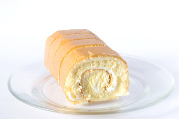 Roller cake on the dish.