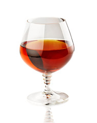 Glass of cognac isolated on white
