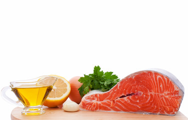 fish trout and spices isolated on white