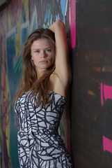 Fototapeta premium Girl against graffiti background