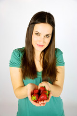 cute female model with strawberries