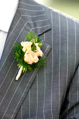 Beautiful wedding boutonniere at groom's costume - 40505707