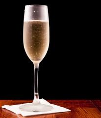 Champagne flute isolated on black