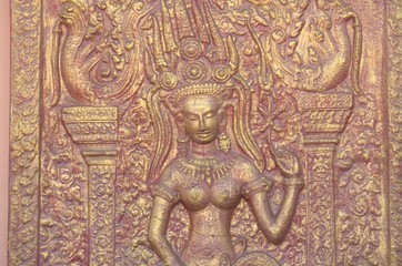 Fototapeta na wymiar Apsara za sztukaterie świątyni Phnom, Phnom Penh, Kambodża