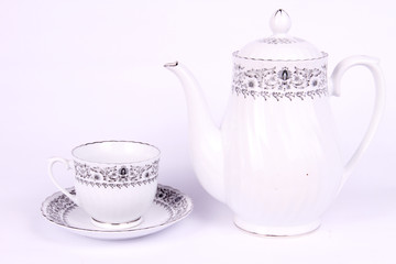 tea cup and tea pot isolated white background
