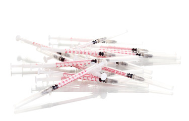 Insulin syringes isolated on white