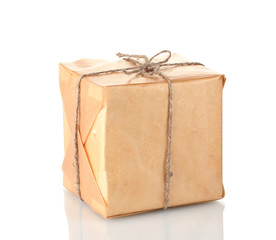 Small parcel wrapped in brown paper tied with twine isolated