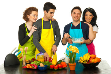 Cheerful friends preparing food