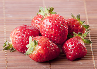 strawberry wooden background closeup