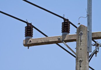 electricity post in blue sky