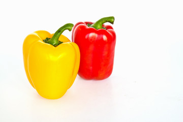 Yellow and Red sweet peppers isolated on a white background