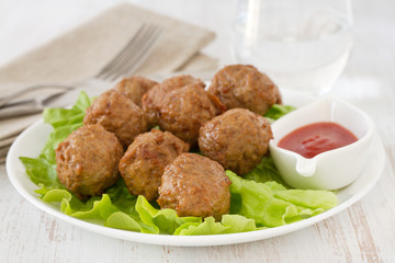 meatballs  on the plate with sauce