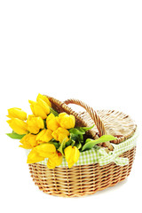 Fototapeta na wymiar Yellow tulips in a basket