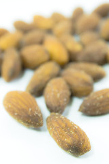 Obraz premium Almonds on white background