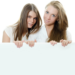 Two girl-friends  isolated on white  background