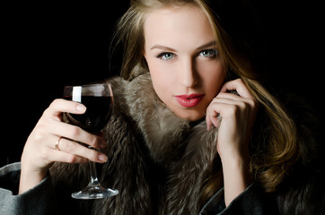 Beautiful girl with a wine glass