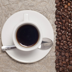 Coffee cup and coffee beans
