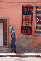 man walking in traditional dress in Morocco