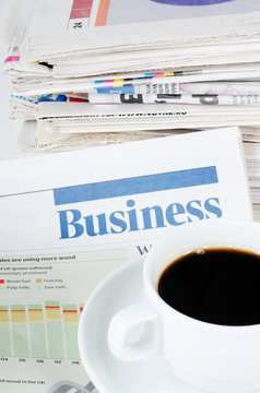Coffee and the fresh newspaper - morning of the businessman