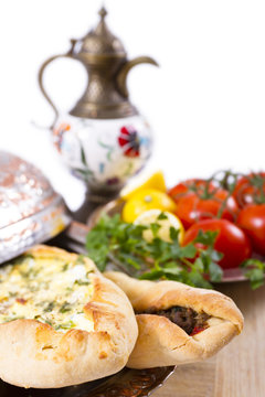 Turkish Pide garnished with vegetables