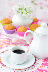 Still Life with a cup of coffee and cupcakes