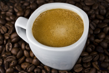 Coffee cup and coffee beans