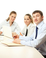 Obraz premium A group of people is working as a business team at the table
