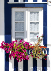Fototapeta na wymiar Typical decorated window in Costa Nova, Ilhavo, Portugal.