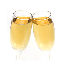 Pair of champagne glasses making a toast