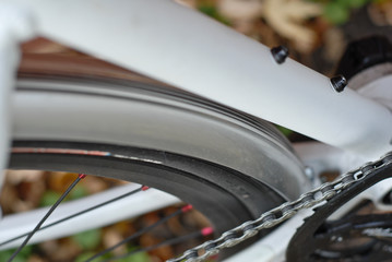 Bicycle fender, tire and chain