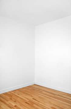Empty Corner Of A Room With Wooden Floor