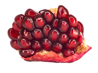 Extreme close up background of a red juicy ripe pomegranate frui