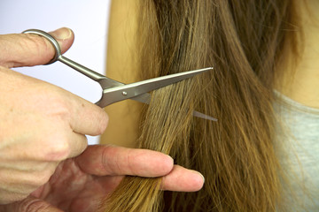 Cutting long hair with scissors