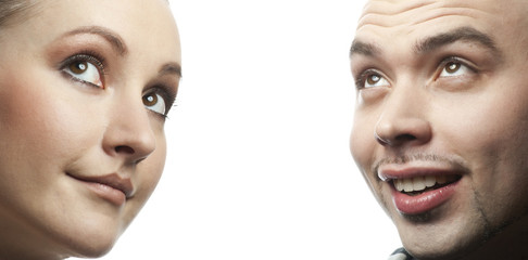 Closeup portrait of happy man and woman looking up