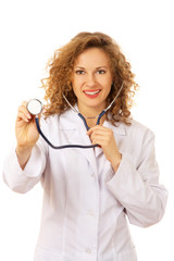 A female doctor with a stethoscope - on white background